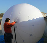 Helium inflation of a sphere